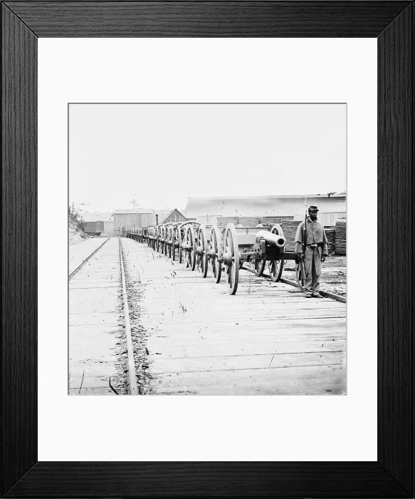 Framed Print : The Civil War, an African American man guarding a cannon, title: Negro soldier guarding 12-pdr. Napoleon, City Point, Virginia, photograph, 1865 Framed Print : The Civil War, an African American man guarding a cannon, title: Negro soldier guarding 12-pdr. Napoleon, City Point, Virginia, photograph, 1865