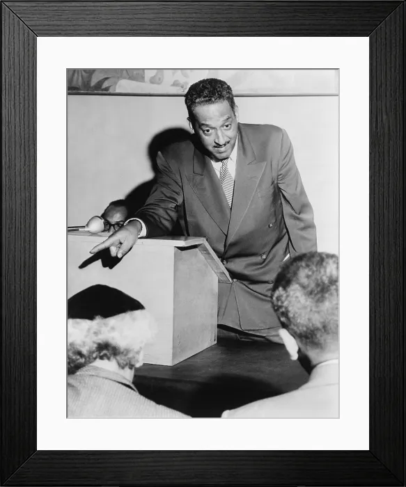 Framed Print : Thurgood Marshall (1908-1993), Chief Counsel for the National Assn. for the Advancement of Colored People, talking to newsmen in New York City. 1955