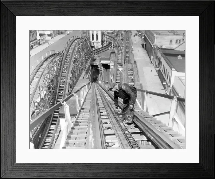 Framed Print : A workman greases up the tracks of the Cyclone roller coaster in Coney Island. New York City, circa March 1936. Courtesy: CSU Archives / Everett Collection Framed Print : A workman greases up the tracks of the Cyclone roller coaster in Coney Island. New York City, circa March 1936. Courtesy: CSU Archives / Everett Collection