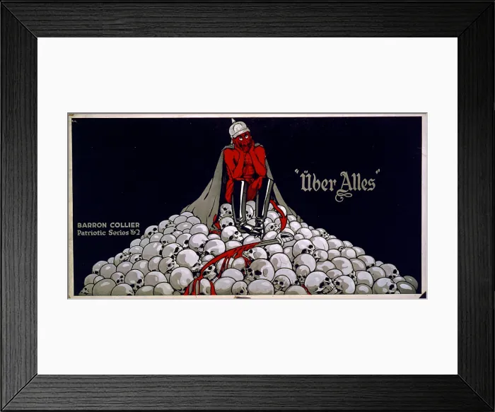Framed Print : World War I, streetcar advertisement showing the devil as a German Soldier on a mound of skulls, bloodied sword at his feet. The text reads: Uber alles