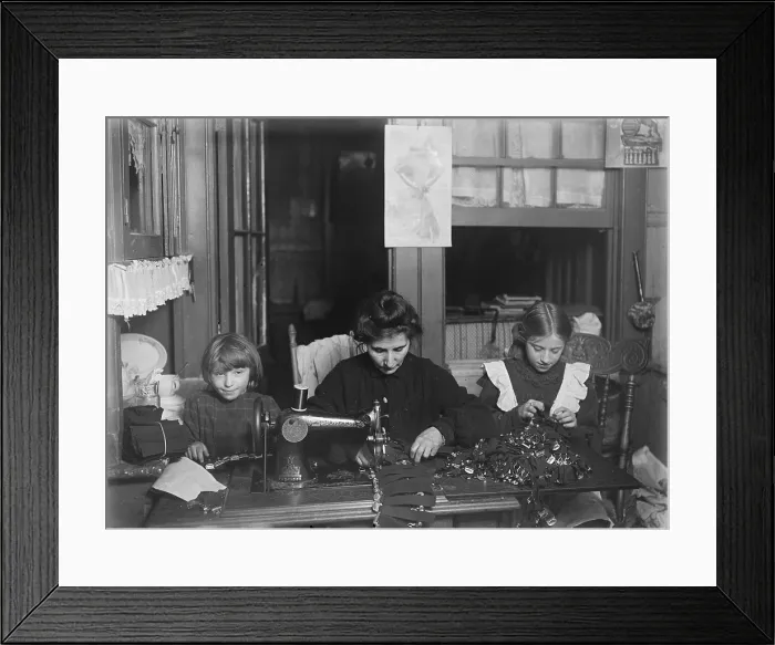 Framed Print : Child labor, making garters for Liberty Garter works, Mrs. Finkelstein, Bessie, age 13, Sophie, age 7 Framed Print : Child labor, making garters for Liberty Garter works, Mrs. Finkelstein, Bessie, age 13, Sophie, age 7