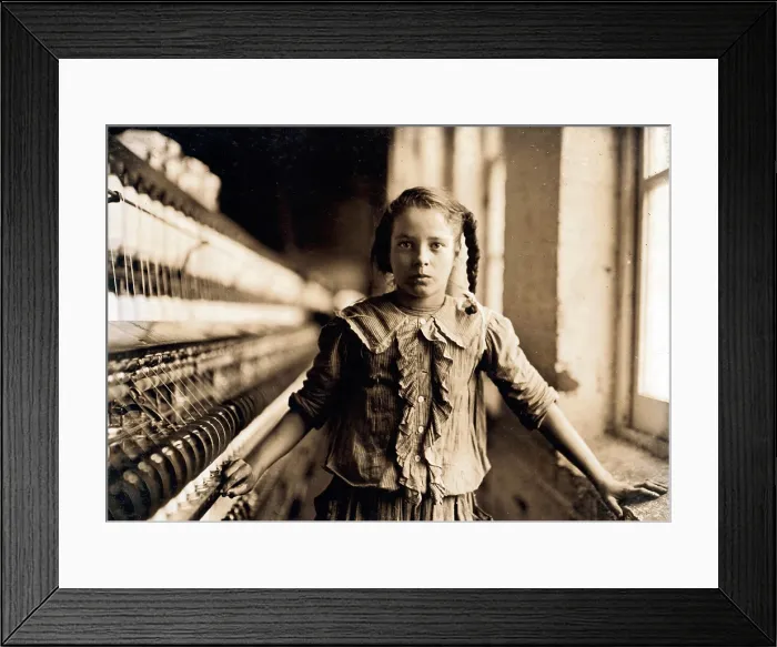 Framed Print : Child laborer portrayed by Lewis Hine in 1908. One of the young spinners in a North Carolina cotton mill earns forty-eight cents a day