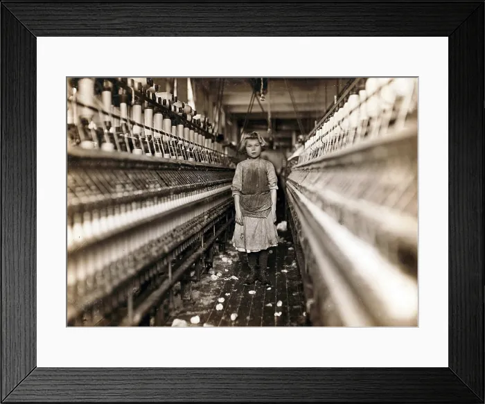 Framed Print : Child laborer portrayed by Lewis Hine in 1909. Little spinner who regularly worked in cotton mill in Augusta, Georgia