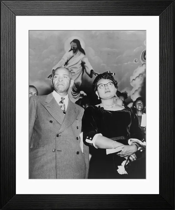 Framed Print : Mamie Bradley, mother of Emmett Till, and her father, John Carthan, attending a rally in New York City church. Her son's murder aroused international outrage