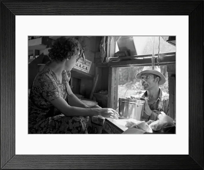 Framed Print : African American man making purchases at a traveling store, original title: Negro making purchase at traveling grocery store, Forrest City, Arkansas