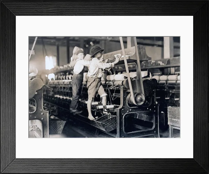 Framed Print : Child laborer portrayed by Lewis Hine in 1909 Framed Print : Child laborer portrayed by Lewis Hine in 1909