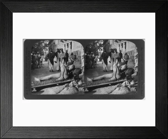 Framed Print : Fakir on his bed of spikes, from original caption: Most spectacular performance of a religious fanatic, India, stereo photograph by H.C. White Company, circa 1907 Framed Print : Fakir on his bed of spikes, from original caption: Most spectacular performance of a religious fanatic, India, stereo photograph by H.C. White Company, circa 1907