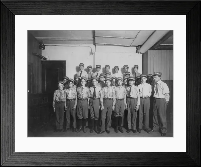 Framed Print : Group of messenger boys, original caption: A typical group of messengers at Postal Telegraph Company's main office, 253 Broadway