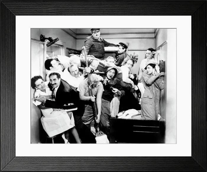 Framed Print : A NIGHT AT THE OPERA, left from top: Jack Lipson, Frank Yaconelli; middle row second, third and fourth from left: Harpo Marx (sleeping), Allan Jones