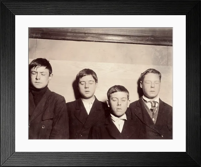 Framed Print : Four young men with eyes closed, original caption: Four incorrigibles not even reached by the Vocational School, Buffalo, New York, photograph by Lewis Wickes Hine