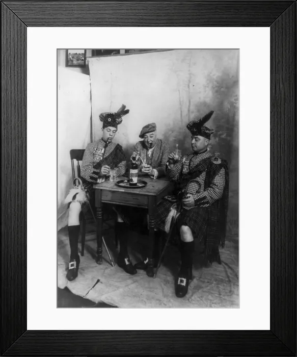 Framed Print : Two men wearing kilts and man smoking cigar, seated at small table drinking Sandy MacDonald scotch, photograph, 1913 Framed Print : Two men wearing kilts and man smoking cigar, seated at small table drinking Sandy MacDonald scotch, photograph, 1913