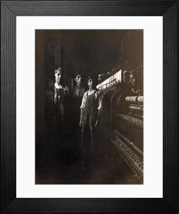 Framed Print : A textile mill. Some of the small boys working in the Amoskeag Mfg. Co. Manchester, N.H, photograph by Lewis Wickes Hine, May 25, 1909