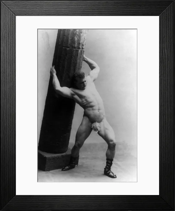 Framed Print : Eugen Sandow (1867-1925) strong man and body builder wearing fig leaf and holding pillar. Photo c. 1894