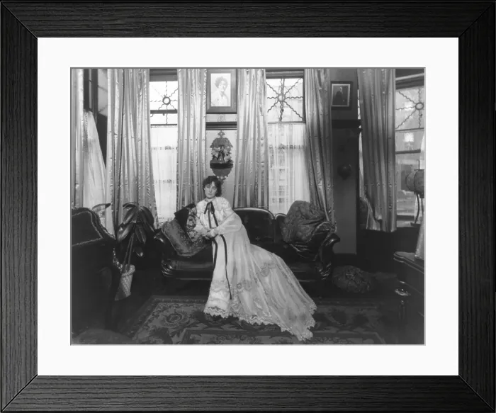 Framed Print : Margaret Anglin, (1876-1958), Canadian born actress, seated on sofa in a elaborately decorated living room. 1903 photo by Joseph Byron Framed Print : Margaret Anglin, (1876-1958), Canadian born actress, seated on sofa in a elaborately decorated living room. 1903 photo by Joseph Byron