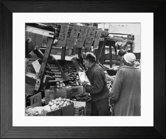 Framed Print : New York City, Vendor selling produce from his pushcart at the Belmont Avenue market, Brooklyn, photograph by Roger Higgins, 1962