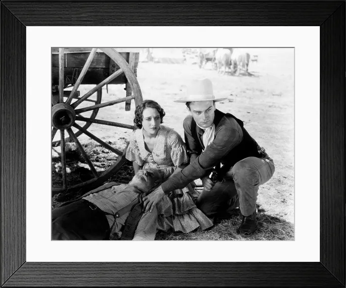 Framed Print : THE BIG STAMPEDE, kneeling, from left, Mae Madison, John Wayne, 1932