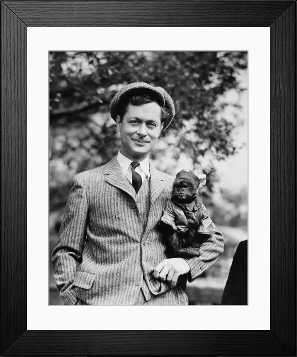 Framed Print : NIGHT MUST FALL, Robert Montgomery and friend on set, 1937