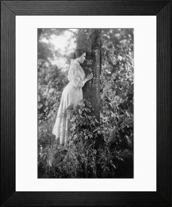 Framed Print : Helen Keller (1880-1968), blind and deaf since age 2, standing by tree, in 1907