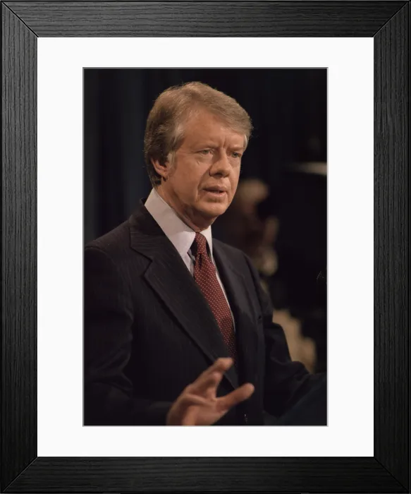 Framed Print : President Jimmy Carter speaking during a press conference. Ca. 1977-1980 Framed Print : President Jimmy Carter speaking during a press conference. Ca. 1977-1980