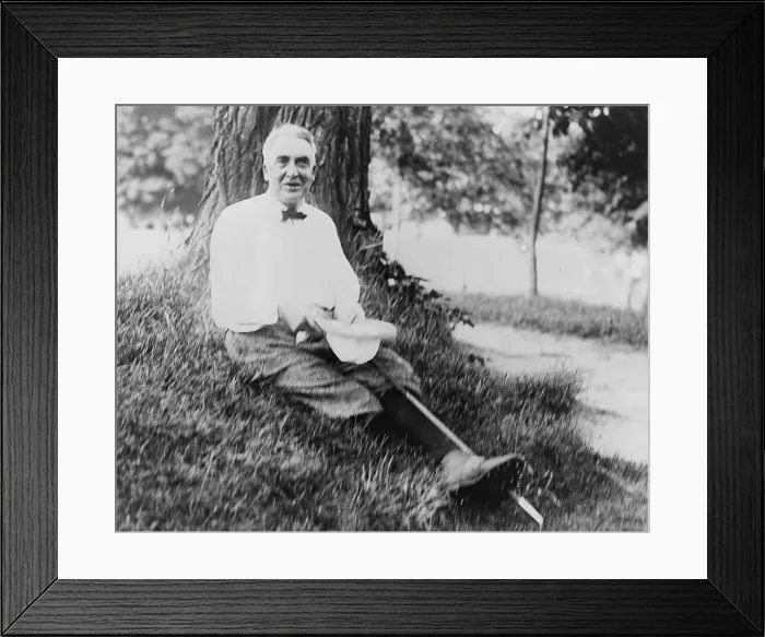 Framed Print : President Warren Harding (1865-1923) wearing golfing clothes, seated on ground beneath tree