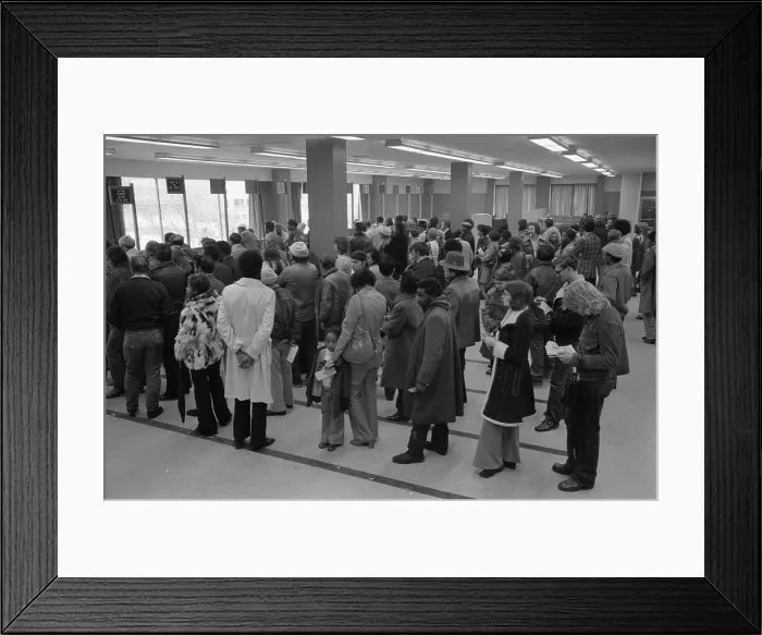 Framed Print : The unemployed and foodstamp applicants wait in long lines at the Baltimore City Welfare Office Maryland. Jan 28 1975 Framed Print : The unemployed and foodstamp applicants wait in long lines at the Baltimore City Welfare Office Maryland. Jan 28 1975