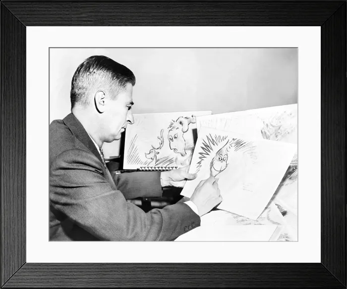 Framed Print : Ted Geisel (Dr. Seuss) (1904-1991) at work on a drawing of the Grinch, a character in his book, 'How the Grinch Stole Christmas.' 1957