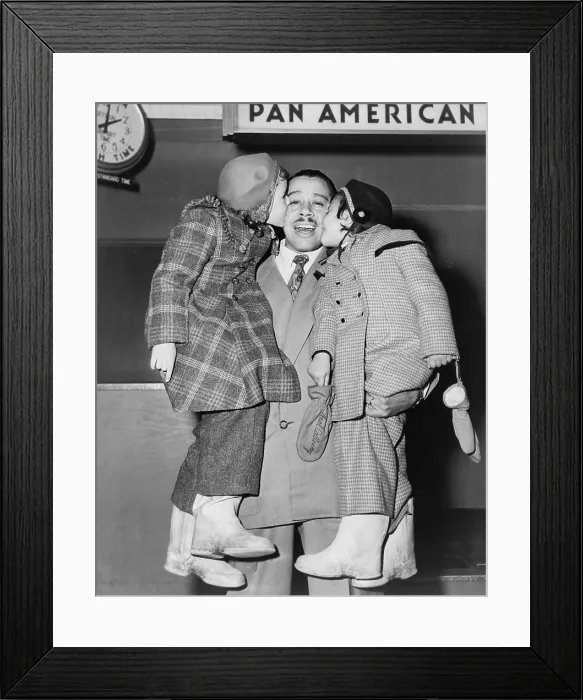 Framed Print : Cab Calloway (1907-1994), greeted by his daughters, Chris and Lael, at the airport in 1951 Framed Print : Cab Calloway (1907-1994), greeted by his daughters, Chris and Lael, at the airport in 1951