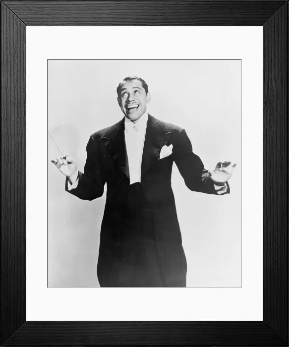 Framed Print : Cab Calloway (1907-1994), flamboyant African America bandleader holding conductor's baton. 1951 Framed Print : Cab Calloway (1907-1994), flamboyant African America bandleader holding conductor's baton. 1951