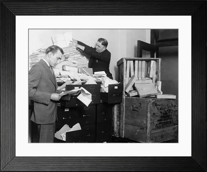 Framed Print : Two employees of the Federal Radio Commission overwhelmed by piles of mail in 1929