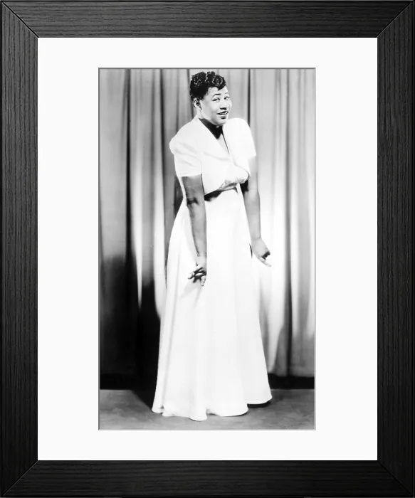 Framed Print : Ella Fitzgerald (1917-1996) had a sixty year career. The title of this 1938 photo refers her first hit song, 'A-Tisket, A-Tasket.' Framed Print : Ella Fitzgerald (1917-1996) had a sixty year career. The title of this 1938 photo refers her first hit song, 'A-Tisket, A-Tasket.'