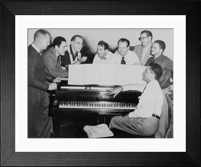 Framed Print : Benny Goodman (1909-86), at rehearsal with his musicians, around piano left to right: Vernon Brown, George Auld, Gene Krupa, Clint Neagley, Ziggy Elman Framed Print : Benny Goodman (1909-86), at rehearsal with his musicians, around piano left to right: Vernon Brown, George Auld, Gene Krupa, Clint Neagley, Ziggy Elman