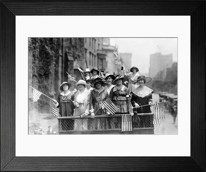 Framed Print : Old Glory. Group of women standing on top of vehicle waving flags, New York City, ca. 1907-1916
