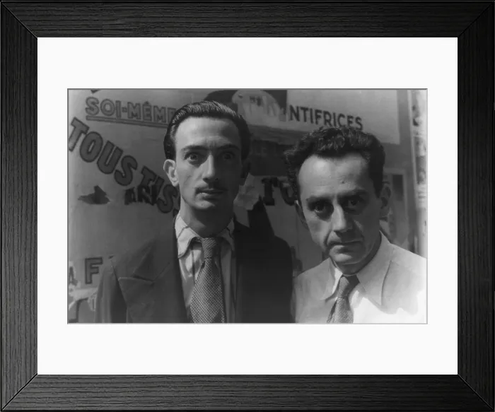 Framed Print : Surrealists artists Salvador Dali (1904-1989) and Man Ray (1890-1976) stare into photographer Carl Van Vechten's camera as he takes their picture in Paris, 1934 Framed Print : Surrealists artists Salvador Dali (1904-1989) and Man Ray (1890-1976) stare into photographer Carl Van Vechten's camera as he takes their picture in Paris, 1934