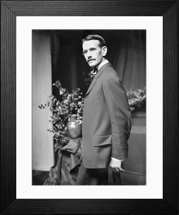 Framed Print : Arthur B. Davies (1862-1928), the American symbolist painter, posed in Gertrude Kasebier's New York City studio in 1907