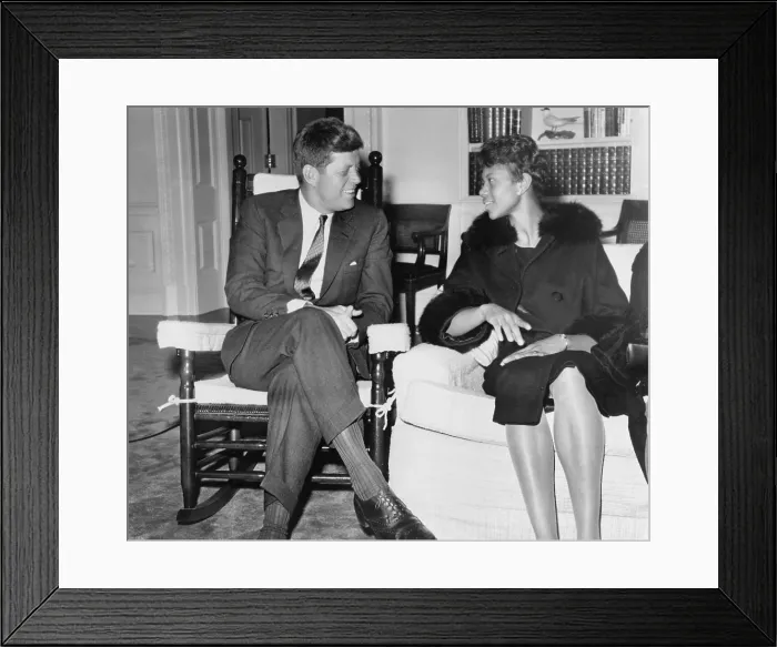 Framed Print : Wilma Rudolph (1940-1994) chats with President Kennedy at the White House. She was the first African American women to win three gold medals at one Olympic games in 1960