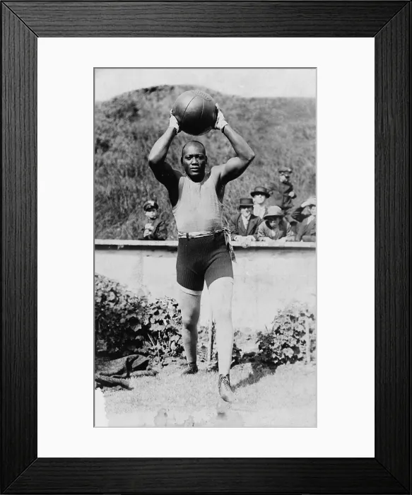 Framed Print : Jack Johnson (1878-1946) the first African American to win the Heavyweight Championship training with a medicine ball, 1910 Framed Print : Jack Johnson (1878-1946) the first African American to win the Heavyweight Championship training with a medicine ball, 1910