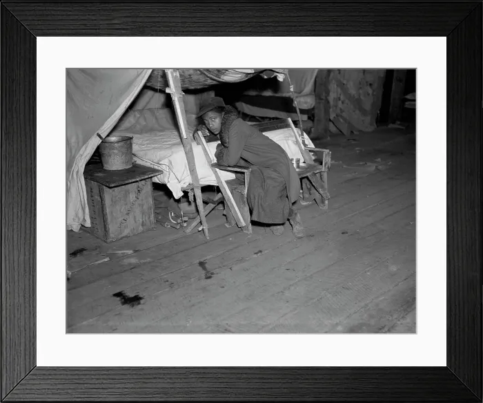 Framed Print : African American girl in infirmary after flood, original title: Negro girl in the temporary infirmary, Forrest City, Arkansas, photograph by Walker Evans, February, 1937