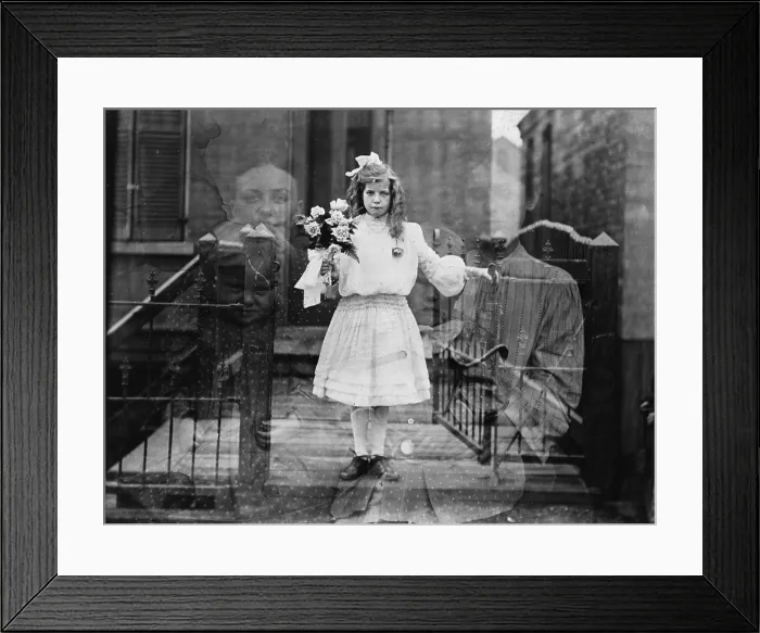 Framed Print : Spirit photograph of girl standing, holding flowers, surrounded by spectral figures of three people, actually a double exposure photograph, photograph by G.S. Smallwood, 1905 Framed Print : Spirit photograph of girl standing, holding flowers, surrounded by spectral figures of three people, actually a double exposure photograph, photograph by G.S. Smallwood, 1905