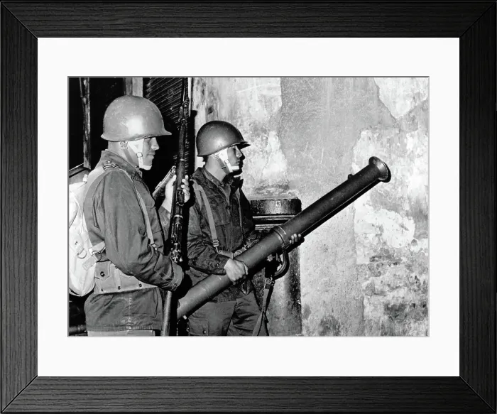 Framed Print : Mexico City: Mexican Army troops prepare to fire bazooka shell through a door of a student 'fortress.' Troops broke up student rioters