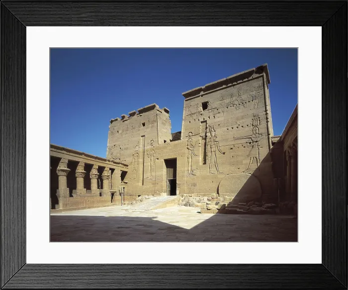 Framed Print : Temple of Isis. EGYPT. ASWAN. Philae. Temple of Isis. Second pylon of the temple. Representation of pharaoh Ptolomy XII making offerings to Hathor and Horus. Egyptian art