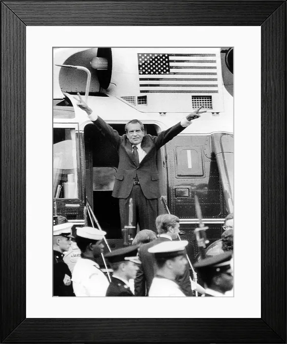 Framed Print : RICHARD NIXON waves with both arms as he bids an emotional farewell to members of his staff after his resignation for the Presidency of the United States. Washington, D.C