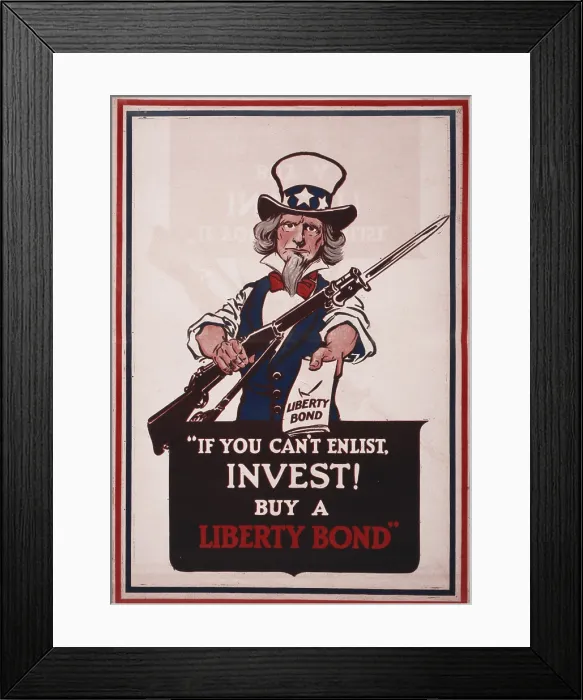 Framed Print : World War I, poster showing Uncle Sam with rifle and bayonet, offering a Liberty Bond, text reads: If you can't enlist, invest! Buy a Liberty bond, poster: 1917