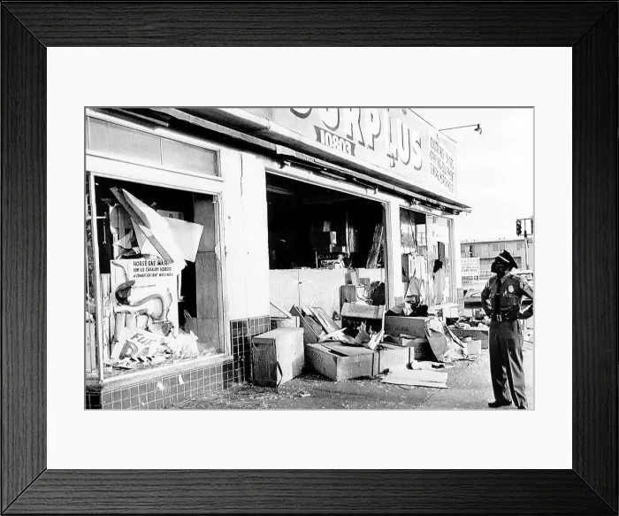 Framed Print : A police officer inspects the damage after the riot in Watts, 1965. Courtesy: CSU Archives / Everett Collection Framed Print : A police officer inspects the damage after the riot in Watts, 1965. Courtesy: CSU Archives / Everett Collection