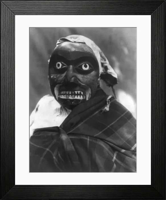 Framed Print : Ceremonial mask worn by a dancer portraying the hunter in Bella Bella mythology who killed the giant man-eating octopus, The dance was performed during Tluwulahu