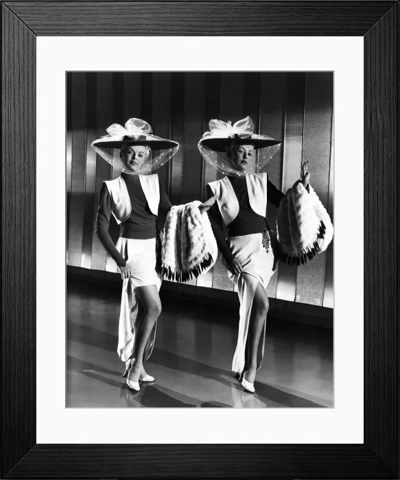 Framed Print : THE DOLLY SISTERS, June Haver, Betty Grable, (in costumes by Orry-Kelly), 1945, TM and copyright 20th Century Fox Film Corp. All rights reserved / Courtesy: Everett Collection Framed Print : THE DOLLY SISTERS, June Haver, Betty Grable, (in costumes by Orry-Kelly), 1945, TM and copyright 20th Century Fox Film Corp. All rights reserved / Courtesy: Everett Collection