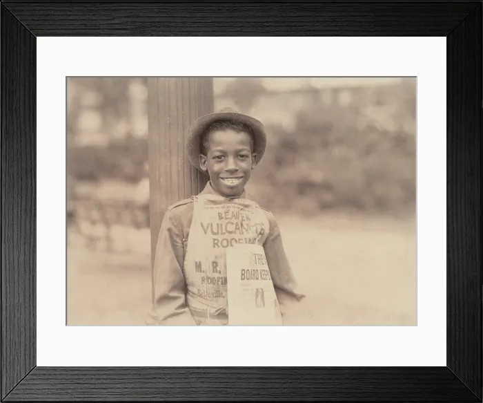 Framed Print : African American newsie, original caption: Roland, eleven year old negro newsboy, Newark, New Jersey, photograph by Lewis Wickes Hine, August 1, 1924