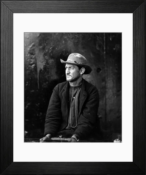Framed Print : Assassins. Edman Spangler, a 'conspirator, ' in hat and manacled. Photograph by Alexander Gardner, April 1865