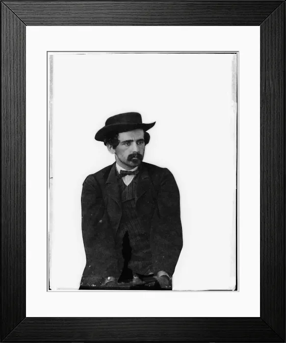 Framed Print : Assassins. Michael O'Laughlin, a Lincoln consipirator, manacled. Photograph by Alexander Gardner, April 1865
