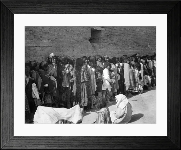Framed Print : American Indians, Apache men, women and children outside agnecy building on issue day, San Carlos, Arizona, photograph, 1899