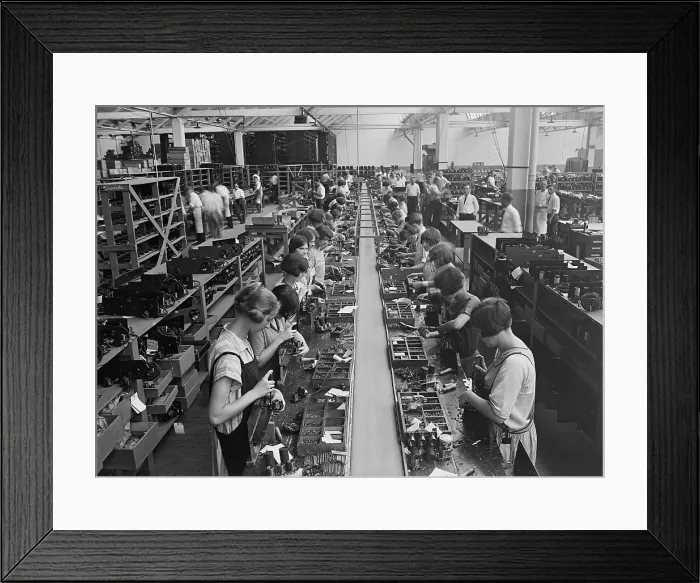 Framed Print : Men and women working on a radio assembly line in Washington D.C. area. 1925